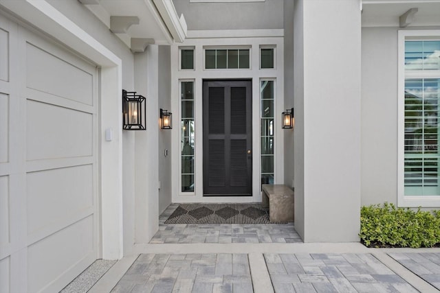 676 Regatta Way, Bradenton, FL 34208 - doorway to property featuring stucco siding