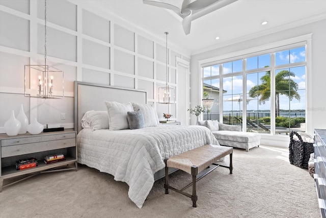 676 Regatta Way, Bradenton, FL 34208 - carpeted bedroom with a chandelier, recessed lighting, ornamental molding, and ceiling fan