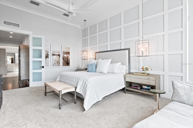 676 Regatta Way, Bradenton, FL 34208 - bedroom with crown molding and a chandelier
