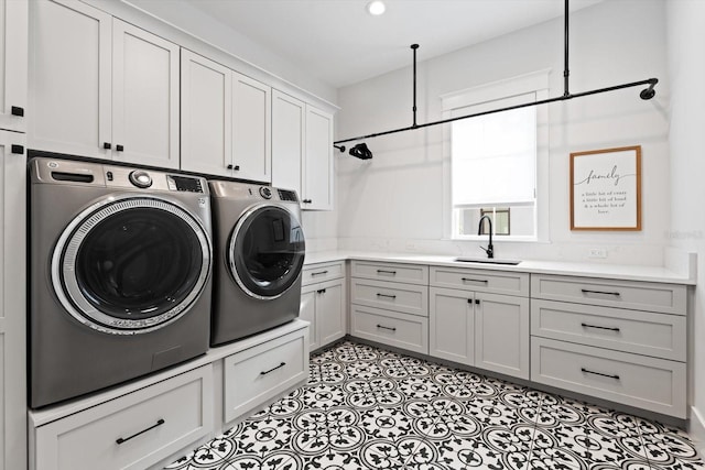 676 Regatta Way, Bradenton, FL 34208 - laundry room with cabinet space and independent washer and dryer