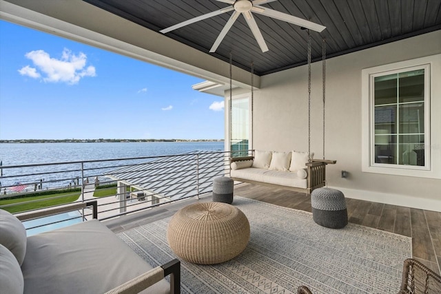 676 Regatta Way, Bradenton, FL 34208 - balcony with a ceiling fan and a water view
