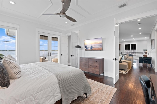 676 Regatta Way, Bradenton, FL 34208 - bedroom with french doors, wood finished floors, recessed lighting, a water view, and a ceiling fan