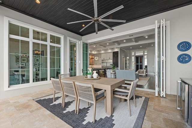 676 Regatta Way, Bradenton, FL 34208 - view of patio with ceiling fan, outdoor dining area, and wine cooler