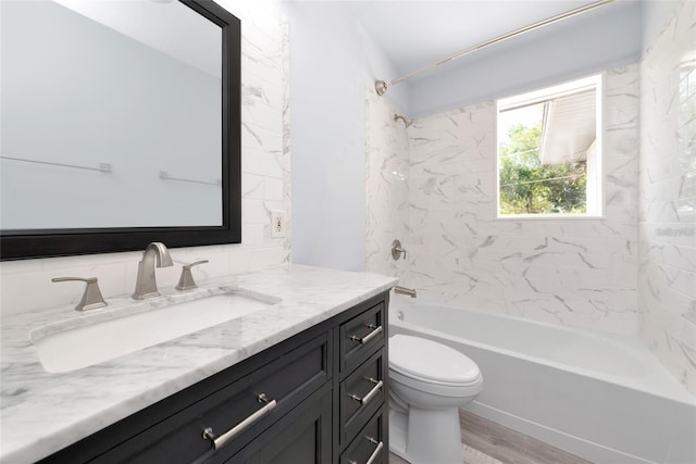 4505 18th Ave W, Bradenton, FL 34209 - full bathroom with vanity, tub / shower combination, and wood finished floors