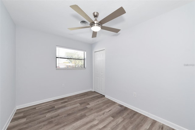 4505 18th Ave W, Bradenton, FL 34209 - unfurnished room with wood finished floors and ceiling fan
