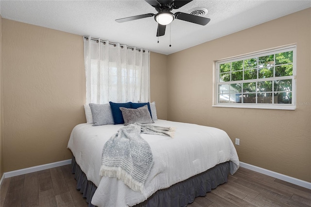 616 59th St NW, Bradenton, FL 34209 - bedroom with wood finished floors and ceiling fan