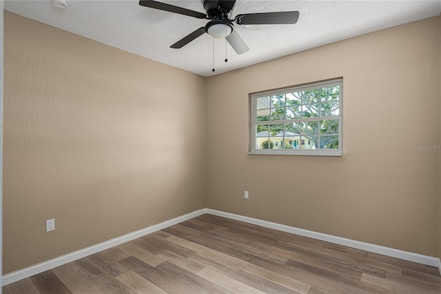 616 59th St NW, Bradenton, FL 34209 - spare room with wood finished floors and a ceiling fan