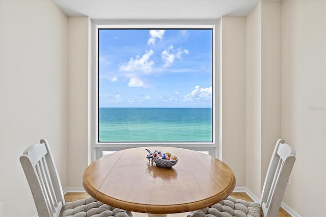 2425 Gulf Of Mexico Dr Unit 10F, Longboat Key, FL 34228 - dining room featuring plenty of natural light