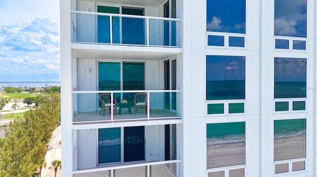 2425 Gulf Of Mexico Dr Unit 10F, Longboat Key, FL 34228 - view of side of home with french doors