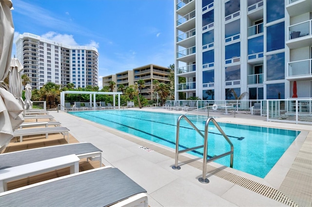 2425 Gulf Of Mexico Dr Unit 10F, Longboat Key, FL 34228 - community pool with a patio