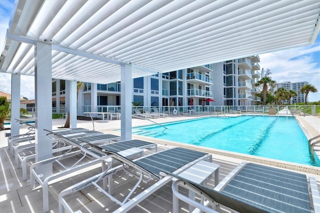 2425 Gulf Of Mexico Dr Unit 10F, Longboat Key, FL 34228 - community pool featuring a patio