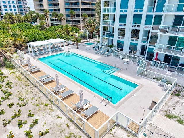 2425 Gulf Of Mexico Dr Unit 10F, Longboat Key, FL 34228 - community pool featuring a patio area