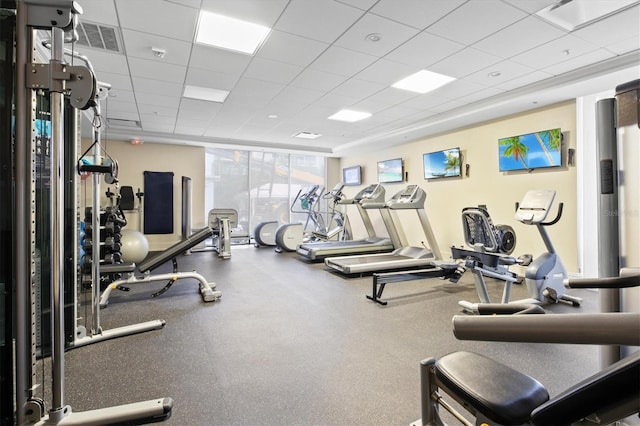 2425 Gulf Of Mexico Dr Unit 10F, Longboat Key, FL 34228 - gym with a paneled ceiling