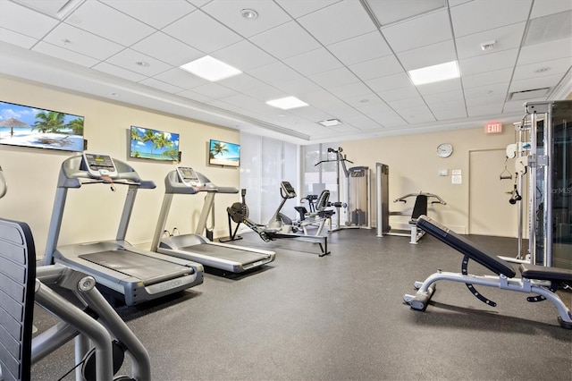 2425 Gulf Of Mexico Dr Unit 10F, Longboat Key, FL 34228 - exercise room featuring a paneled ceiling