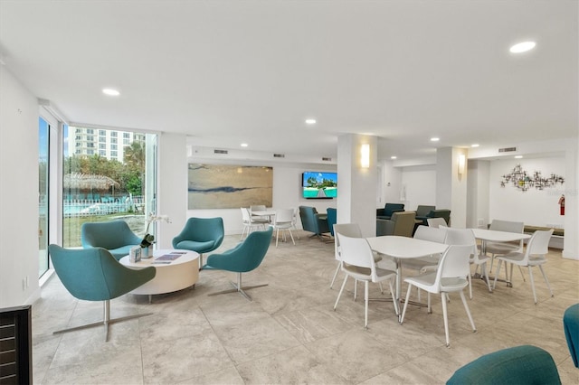 2425 Gulf Of Mexico Dr Unit 10F, Longboat Key, FL 34228 - dining room featuring recessed lighting
