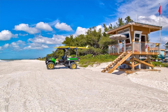 2425 Gulf Of Mexico Dr Unit 10F, Longboat Key, FL 34228 - view of play area featuring stairs