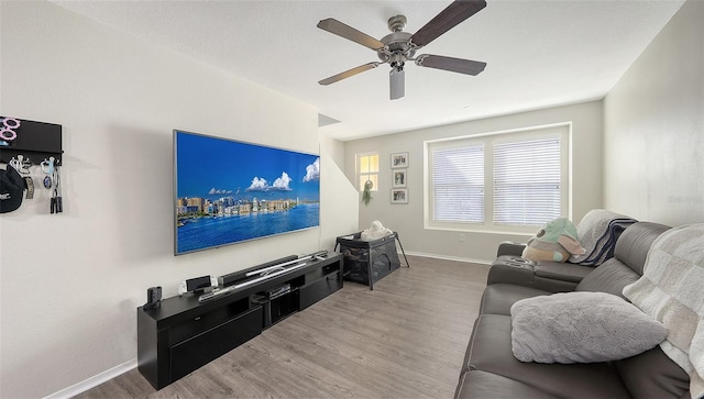 8907 White Sage Loop, Lakewood Ranch, FL 34202 - living room with wood finished floors and a ceiling fan