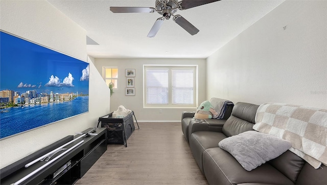 8907 White Sage Loop, Lakewood Ranch, FL 34202 - living area featuring wood finished floors and a ceiling fan