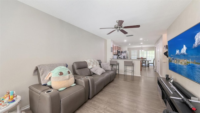 8907 White Sage Loop, Lakewood Ranch, FL 34202 - living room featuring ceiling fan, light wood finished floors, and recessed lighting