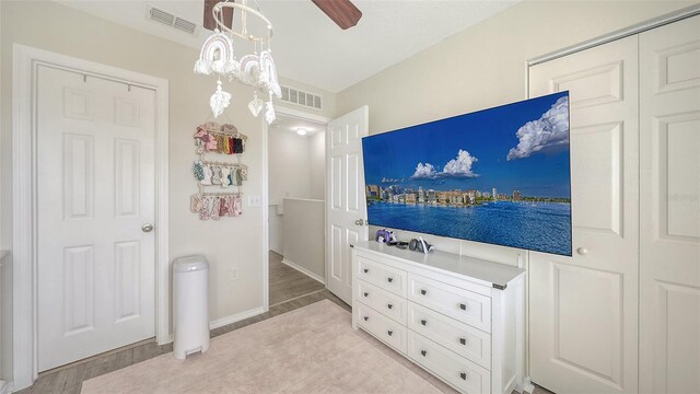 8907 White Sage Loop, Lakewood Ranch, FL 34202 - bedroom featuring light wood-style flooring