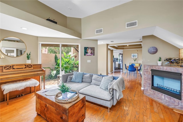200 Cocoanut Ave Unit 1, Sarasota, FL 34236 - living area with a high ceiling and light wood finished floors