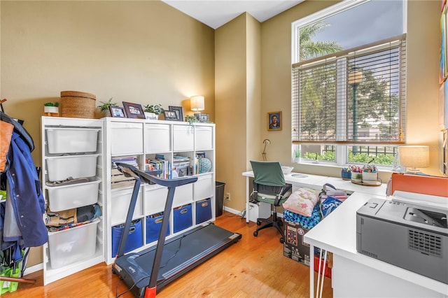 200 Cocoanut Ave Unit 1, Sarasota, FL 34236 - miscellaneous room with wood finished floors, plenty of natural light, and an office area
