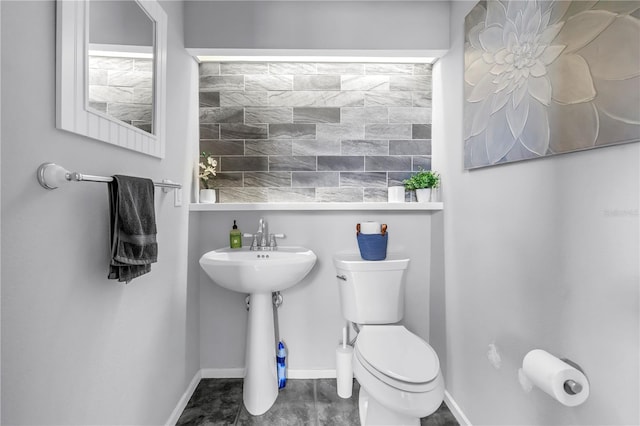 200 Cocoanut Ave Unit 1, Sarasota, FL 34236 - bathroom featuring toilet and baseboards