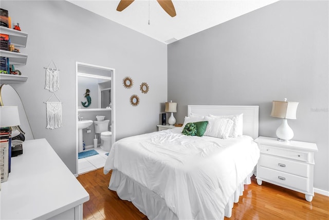 200 Cocoanut Ave Unit 1, Sarasota, FL 34236 - bedroom featuring light wood-style flooring, connected bathroom, and ceiling fan