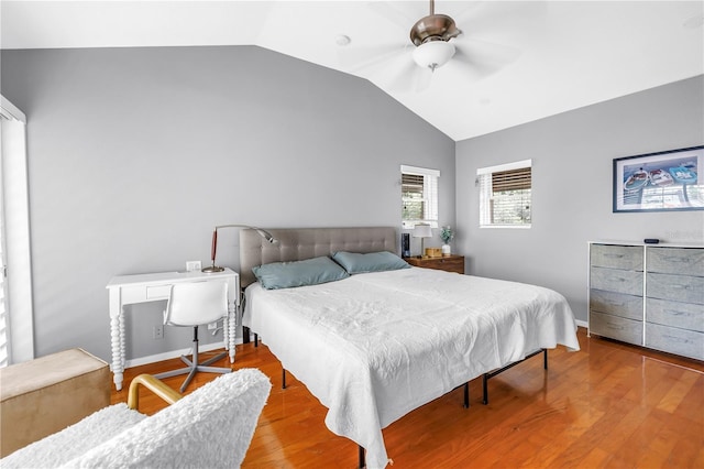 200 Cocoanut Ave Unit 1, Sarasota, FL 34236 - bedroom with vaulted ceiling, wood finished floors, and ceiling fan