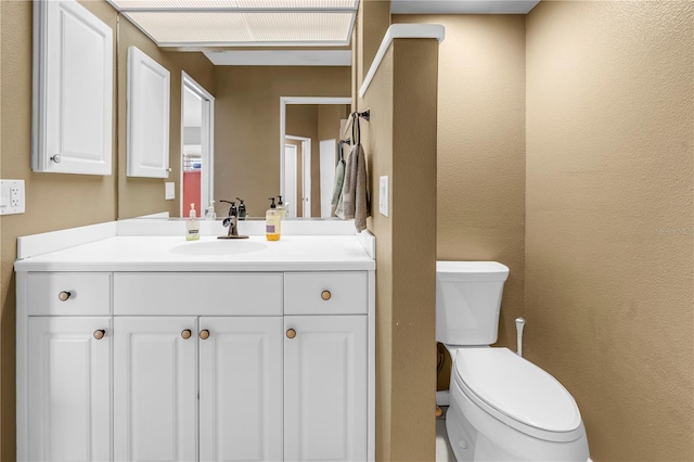 200 Cocoanut Ave Unit 1, Sarasota, FL 34236 - bathroom with vanity and a textured wall