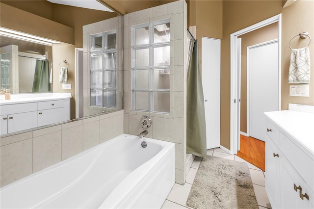 200 Cocoanut Ave Unit 1, Sarasota, FL 34236 - full bath featuring vanity, tile patterned flooring, a bath, and a shower stall