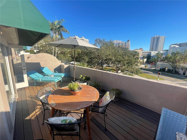 200 Cocoanut Ave Unit 1, Sarasota, FL 34236 - wooden terrace featuring a view of city
