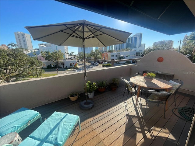 200 Cocoanut Ave Unit 1, Sarasota, FL 34236 - wooden terrace featuring a city view