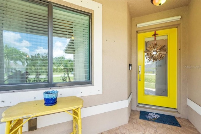 529 Sunset Rd N, Rotonda West, FL 33947 - entrance to property featuring stucco siding