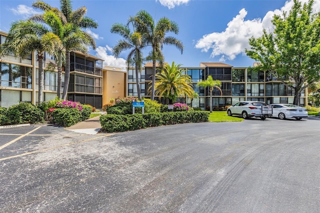 618 Bird Bay Dr S Unit 113, Venice, FL 34285 - view of building exterior featuring uncovered parking