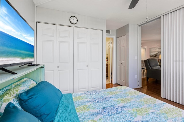 618 Bird Bay Dr S Unit 113, Venice, FL 34285 - bedroom with wood finished floors and a ceiling fan