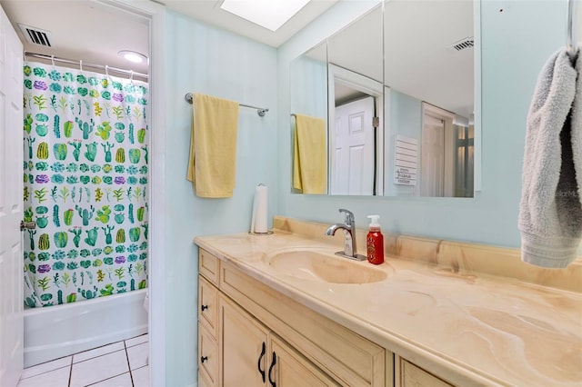 618 Bird Bay Dr S Unit 113, Venice, FL 34285 - bathroom featuring vanity, tile patterned floors, and shower / bathtub combination with curtain