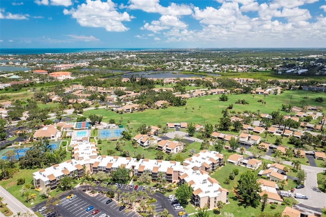 618 Bird Bay Dr S Unit 113, Venice, FL 34285 - aerial perspective of suburban area featuring a nearby body of water and a local golf course