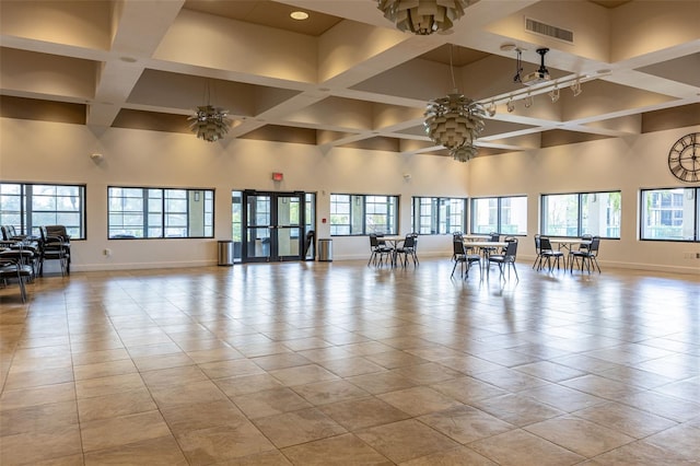 618 Bird Bay Dr S Unit 113, Venice, FL 34285 - lobby with coffered ceiling, a high ceiling, and beamed ceiling