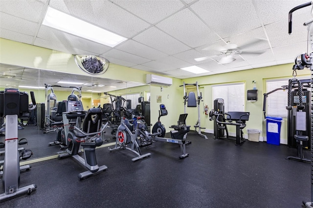 618 Bird Bay Dr S Unit 113, Venice, FL 34285 - exercise room with a wall mounted air conditioner and a paneled ceiling