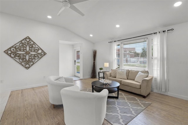 3310 W 9th Ave, Bradenton, FL 34205 - living room with wood finished floors, recessed lighting, ceiling fan, and lofted ceiling