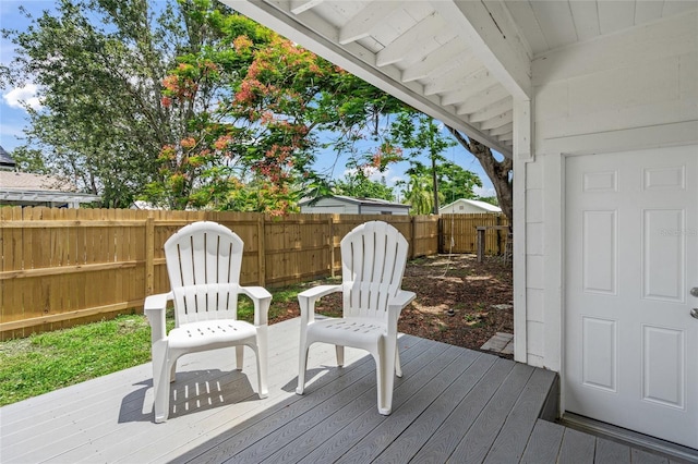 3310 W 9th Ave, Bradenton, FL 34205 - wooden terrace featuring a fenced backyard