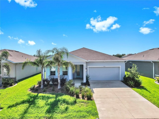 6120 115th Ave E, Parrish, FL 34219 - ranch-style house with an attached garage, a front lawn, concrete driveway, and covered porch