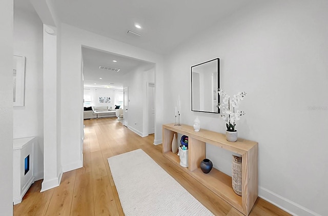 6120 115th Ave E, Parrish, FL 34219 - hallway with light wood finished floors and recessed lighting