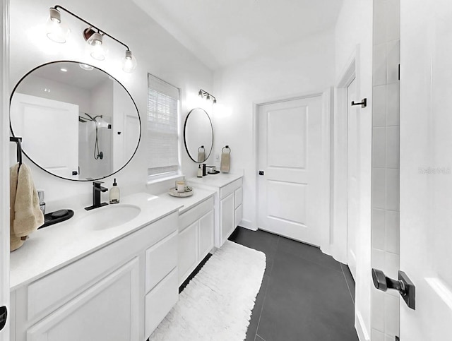 6120 115th Ave E, Parrish, FL 34219 - bathroom featuring vanity, tile patterned flooring, and a shower
