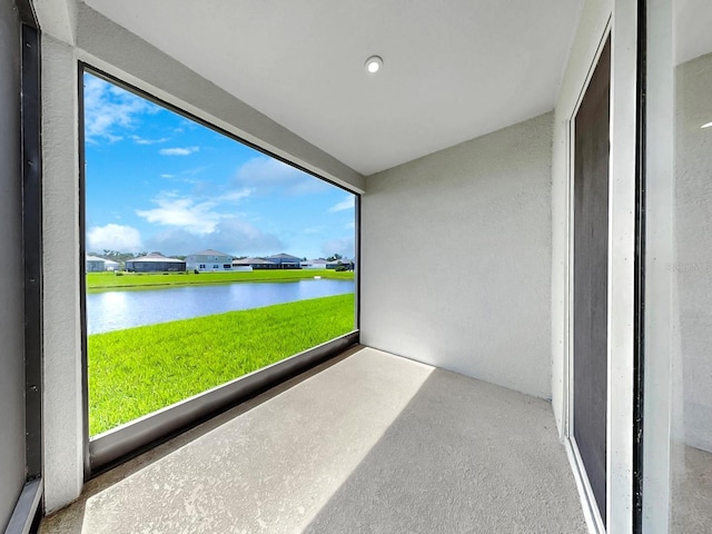 6120 115th Ave E, Parrish, FL 34219 - unfurnished sunroom featuring a water view, healthy amount of natural light, and a residential view