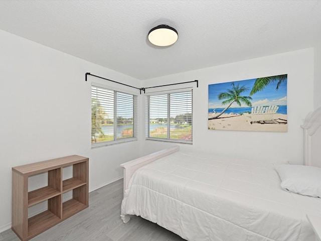 5184 51st Ln W, Bradenton, FL 34210 - bedroom with wood finished floors and baseboards