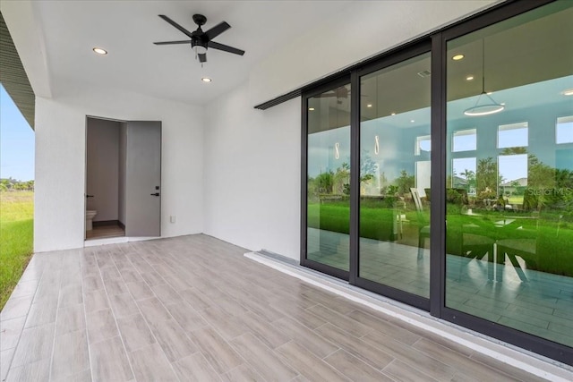 9150 Key W St, Port Charlotte, FL 33981 - spare room featuring ceiling fan, wood finished floors, and recessed lighting