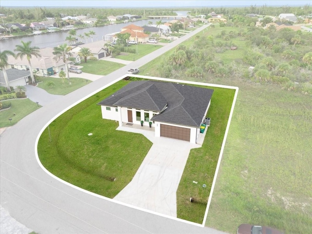 9150 Key W St, Port Charlotte, FL 33981 - aerial perspective of suburban area with a nearby body of water and property parcel outlined
