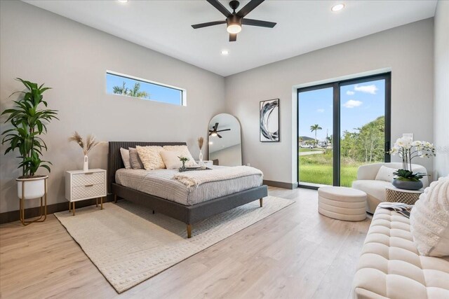 9150 Key W St, Port Charlotte, FL 33981 - bedroom with access to exterior, recessed lighting, light wood finished floors, and a ceiling fan